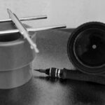 Kit de réparation pour objectif photo.