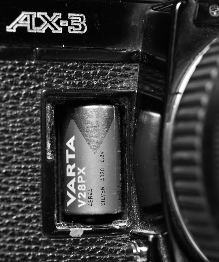 Fujica AX-3 + pile sr44