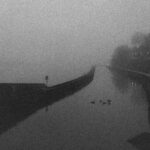 A grainy black and white picture of the towing path at Orléans, France.