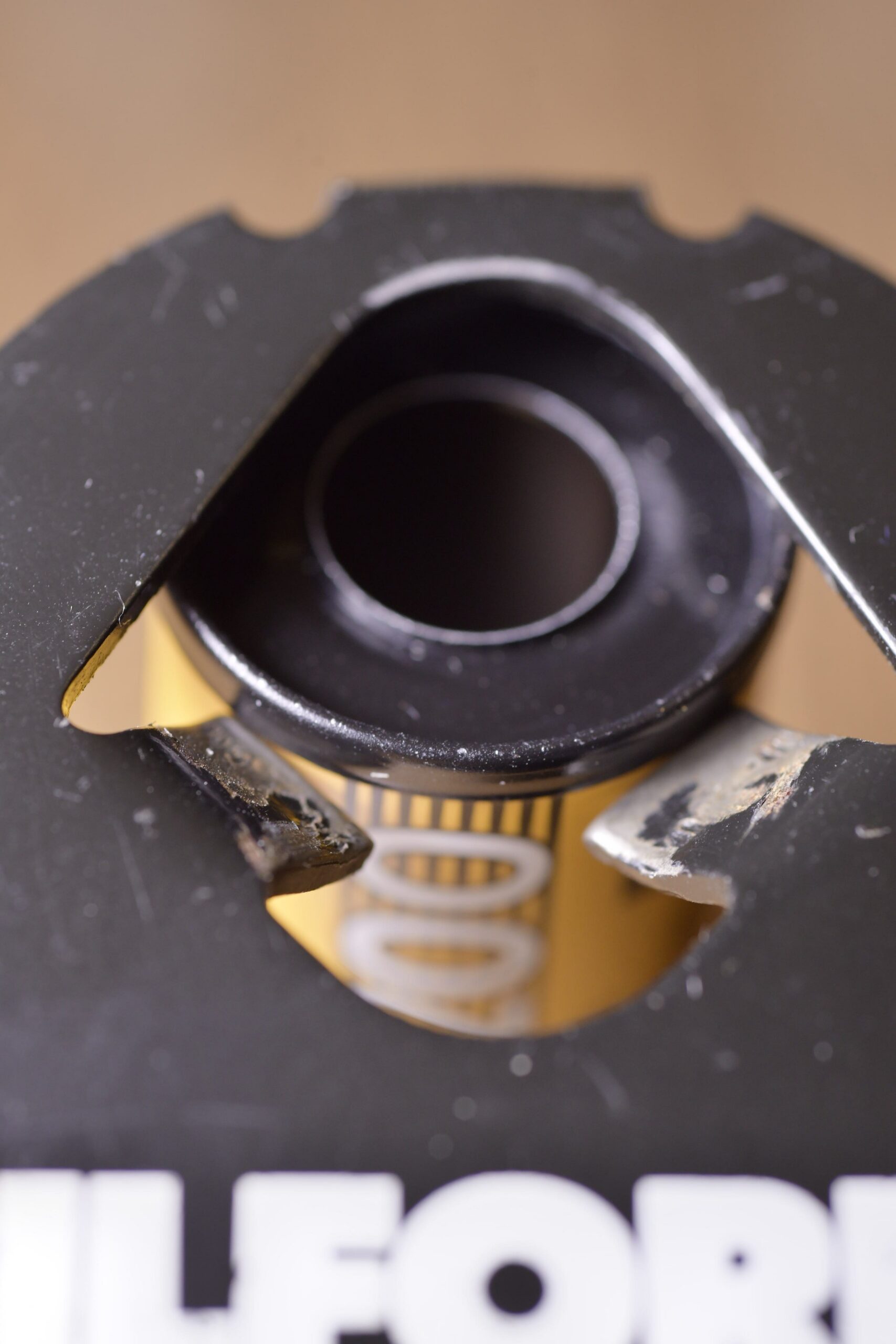 35mm film can opener
